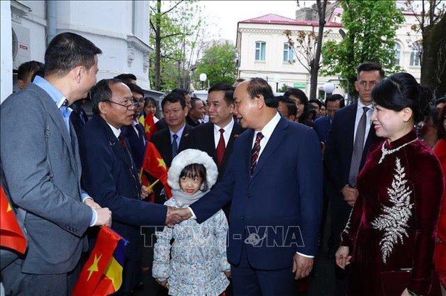 Kiều bào là bộ phận không tách rời của cộng đồng dân tộc Việt Nam - Ảnh 1. Kiều bào là bộ phận không tách rời của cộng đồng dân tộc Việt Nam - Ảnh 1.