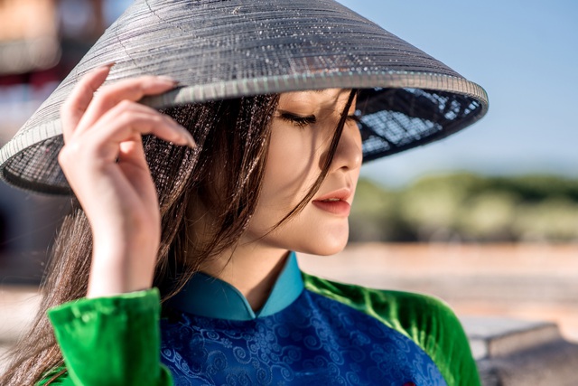 Mỹ nhân có mái tóc đẹp nhất Hoa hậu Việt Nam 2016 tái xuất với áo dài của Kenny Thái - Ảnh 4.