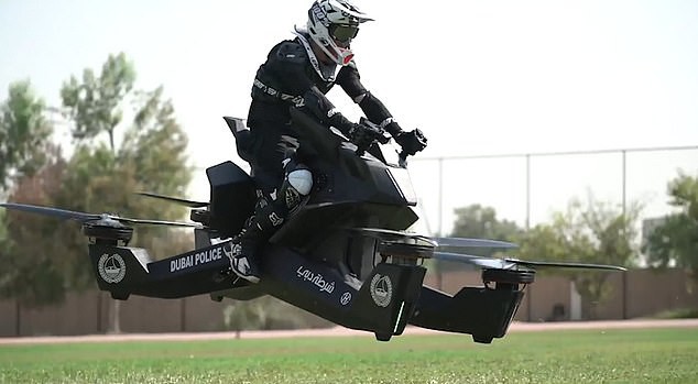 Ngỡ phim viễn tưởng nhưng là thật: cảnh sát Dubai lượn xe máy bay trên trời - Ảnh 4.
