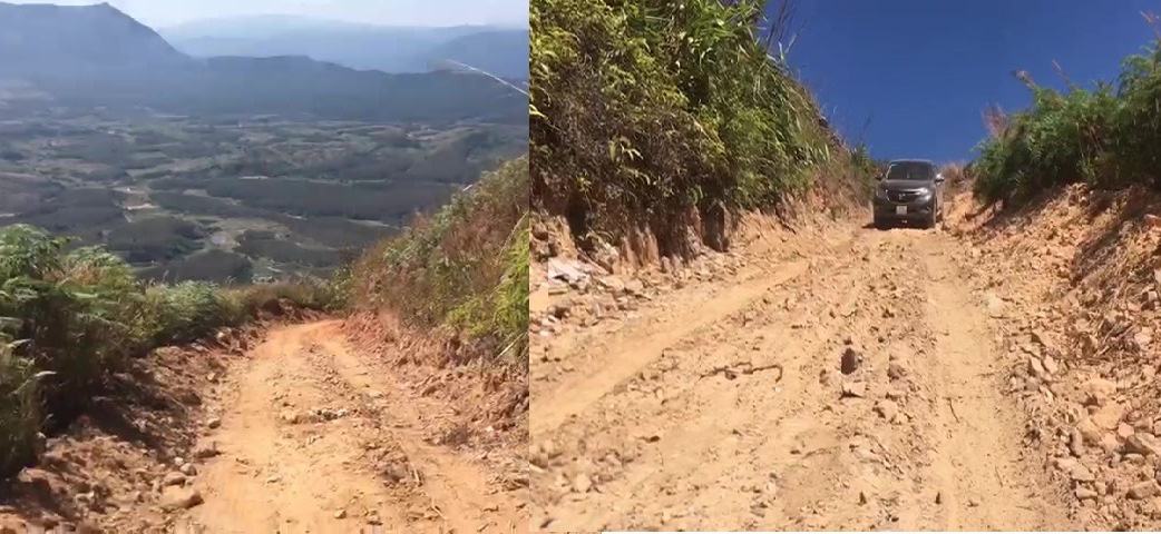 Hình ảnh con đường đi lên 2 điểm cao một bên là núi, một bên là vực sâu. Hình ảnh con đường đi lên 2 điểm cao một bên là núi, một bên là vực sâu.