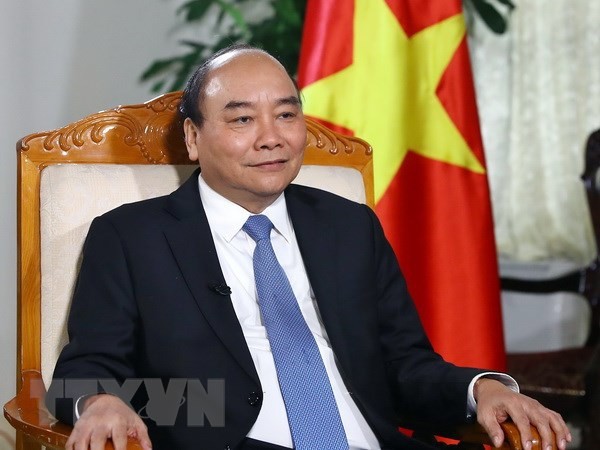 Thủ tướng Nguyễn Xuân Phúc: Hy vọng Việt Nam sẽ trở thành cầu nối cho tiến trình giải quyết vấn đề hạt nhân trên bán đảo Triều Tiên - Ảnh 1.
