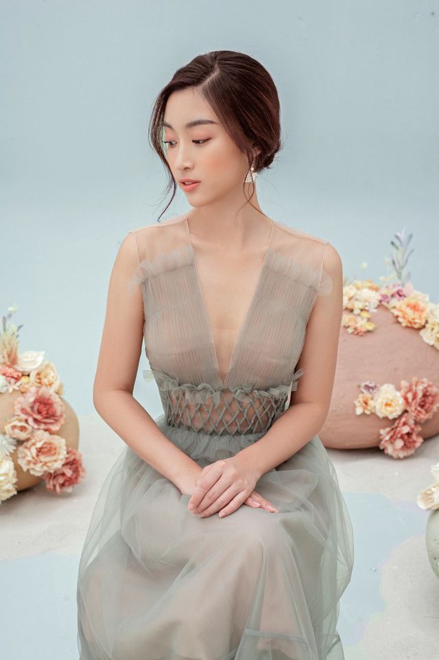 Hoa hậu Đỗ Mỹ Linh gợi cảm hơn sau tin đồn yêu thiếu gia - Ảnh 1.