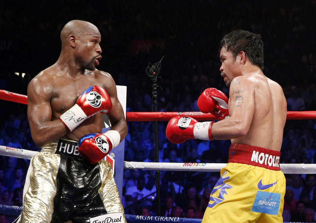 Manny Pacquiao nhận được lời đề nghị &quot;khủng&quot; để tái đấu cùng Floyd Mayweather - Ảnh 1.