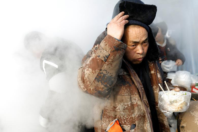 24h qua ảnh: Vũ công trình diễn ngoài trời giá lạnh ở Trung Quốc - Ảnh 5.