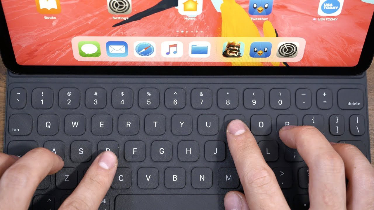 Apple sắp ra mắt bàn phím tích hợp bàn rê cho iPad Pro - Ảnh 2.