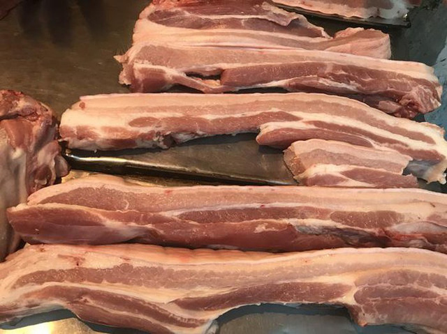 Giá thịt lợn có thể giảm xuống 60.000 đồng/kg lợn hơi thời điểm hết quý 3 - Ảnh 1.