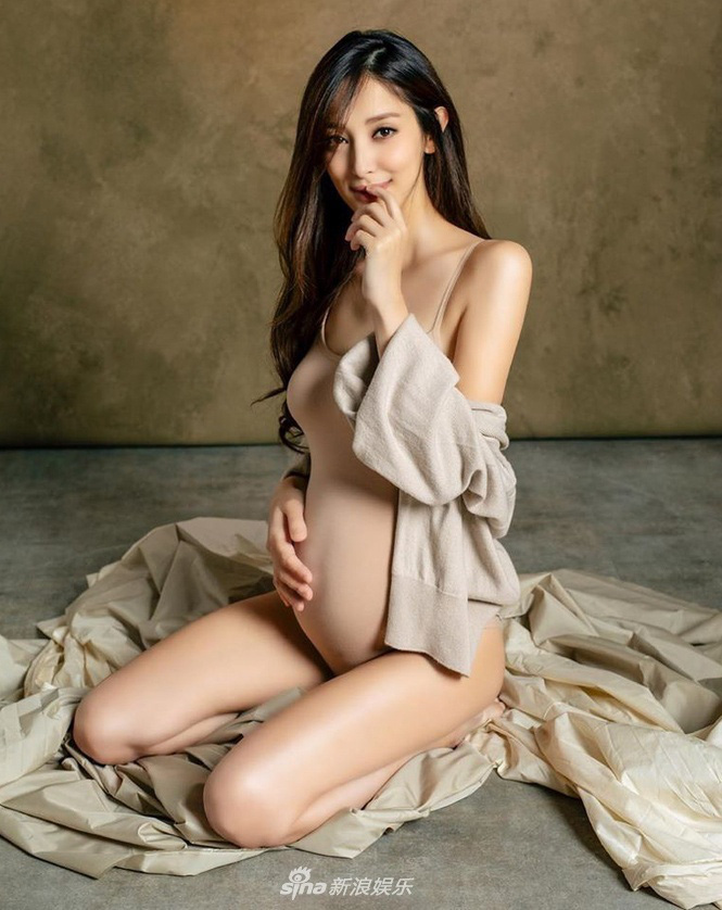 Hoa hậu Hong Kong khiến con trai vua sòng bài Macau say đắm ngày càng gợi cảm khi mang bầu - Ảnh 10.