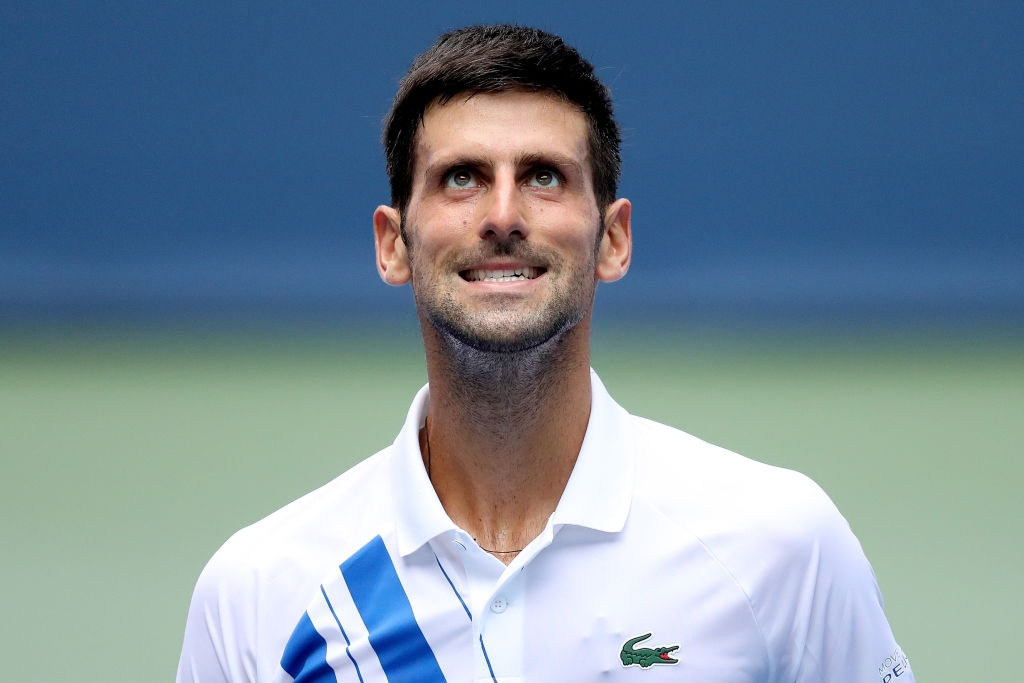 Djokovic ngược dòng nghẹt thở, chỉ còn cách kỷ lục vô địch của Nadal đúng 1 chiến thắng - Ảnh 1.