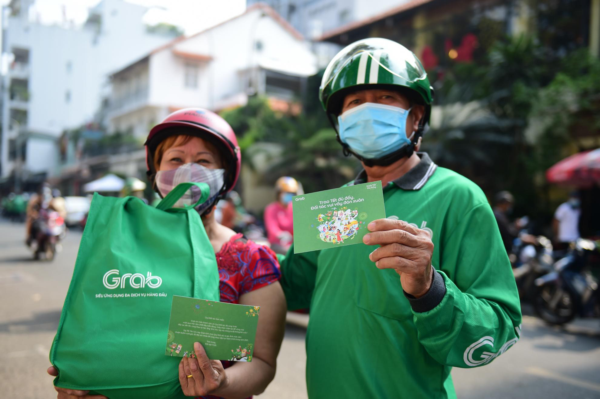 Tết “đủ đầy” đã đến với đối tác Grab và cộng đồng - Ảnh 1.