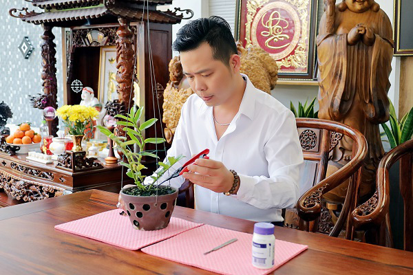 Trương Tấn Lợi - ông chủ 8X mở vườn lan từ đam mê - Ảnh 1.