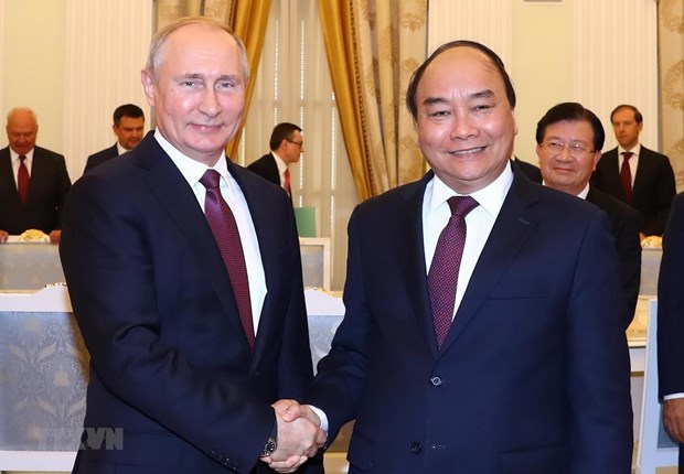Chủ tịch nước Nguyễn Xuân Phúc đề nghị Việt Nam - Nga tăng cường hợp tác phòng chống đại dịch COVID-19 - Ảnh 1.