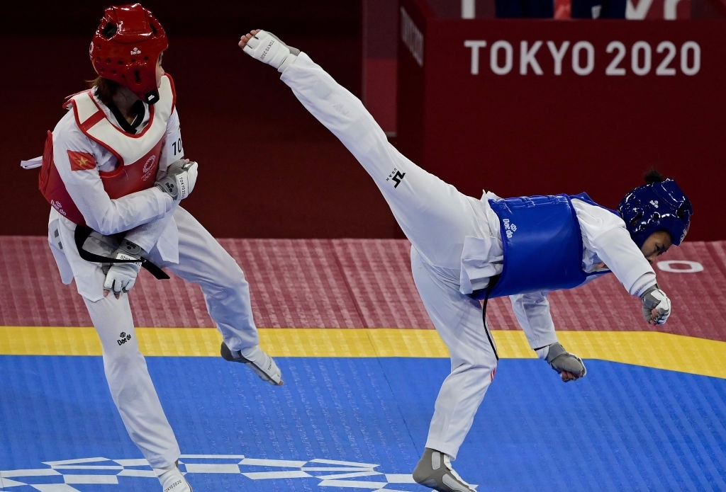 Trương Thị Kim Tuyền &quot;lấy nhu thắng cương&quot; đả bại đại diện Canada trận ra quân Taekwondo Olympic Tokyo 2020 - Ảnh 1.