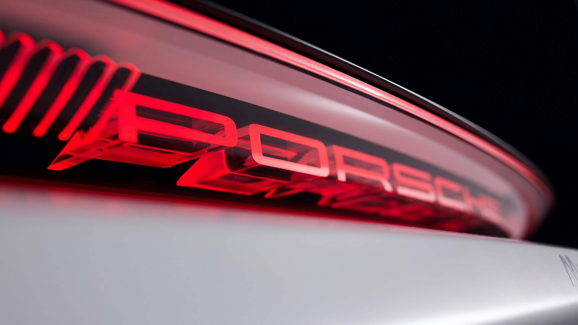 Porsche hé lộ xe mới ra mắt ngày mai với cụm đèn hậu 3D - Ảnh 1.