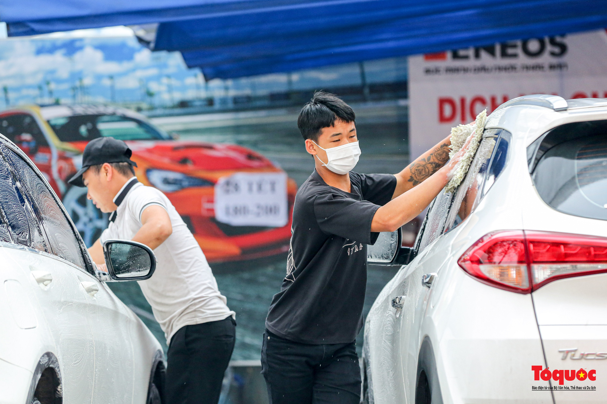 Rửa xe ngày Tết: Dịch vụ kiếm tiền triệu mỗi ngày - Ảnh 7.