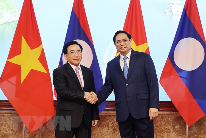 Thủ tướng Phạm Minh Chính chủ trì đón Thủ tướng Lào Phankham Viphavanh - Ảnh 12.