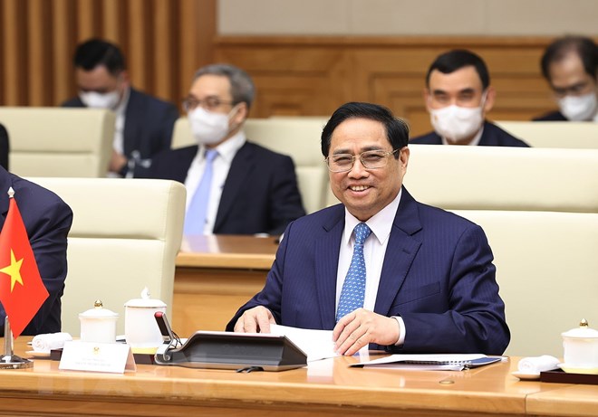 Thủ tướng Phạm Minh Chính chủ trì đón Thủ tướng Lào Phankham Viphavanh - Ảnh 17.