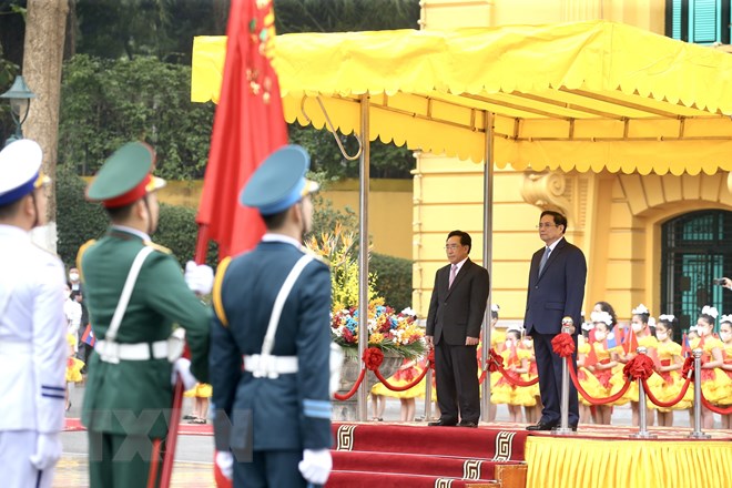 Thủ tướng Phạm Minh Chính chủ trì đón Thủ tướng Lào Phankham Viphavanh - Ảnh 6.