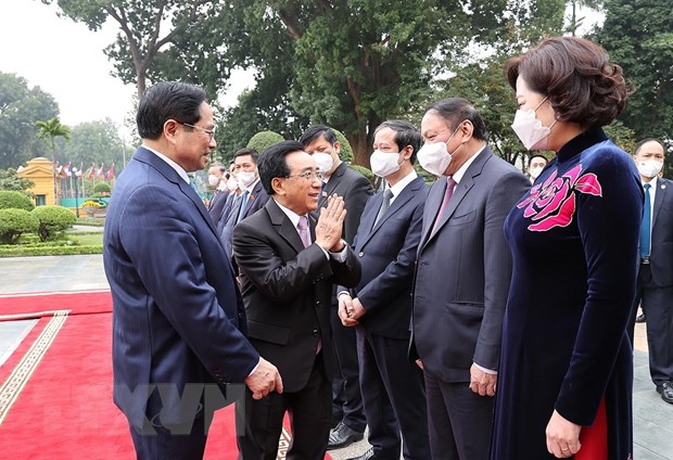 Thủ tướng Phạm Minh Chính chủ trì đón Thủ tướng Lào Phankham Viphavanh - Ảnh 2.