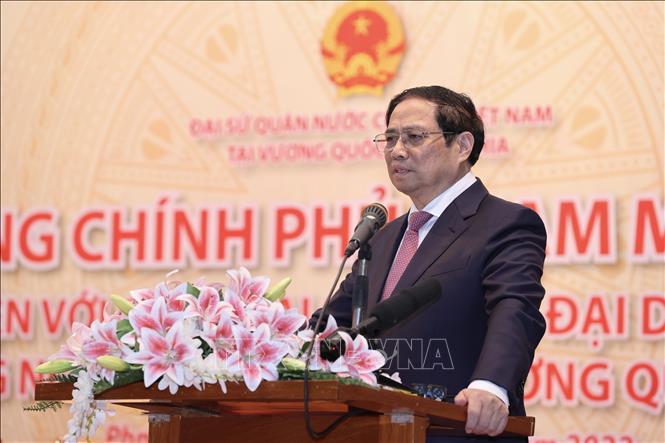 Thủ tướng Phạm Minh Chính gặp gỡ cộng đồng người Việt Nam tại Campuchia - Ảnh 4.