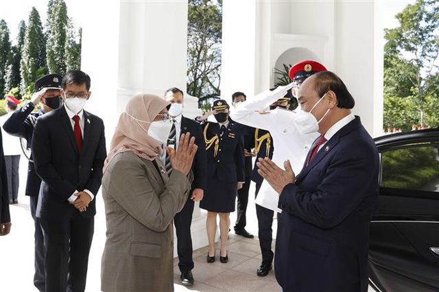 Các hoạt động của Chủ tịch nước Nguyễn Xuân Phúc trong chuyến thăm Singapore - Ảnh 1.