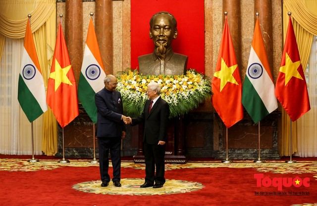 Tổng Bí thư, Chủ tịch nước Nguyễn Phú Trọng chủ trì Lễ đón chính thức Tổng thống Ấn Độ thăm cấp Nhà nước tới Việt Nam - Ảnh 10.