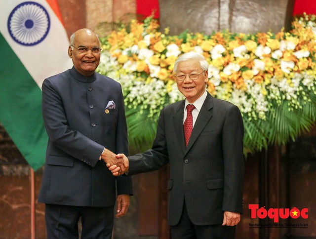 Tổng Bí thư, Chủ tịch nước Nguyễn Phú Trọng chủ trì Lễ đón chính thức Tổng thống Ấn Độ thăm cấp Nhà nước tới Việt Nam - Ảnh 9.