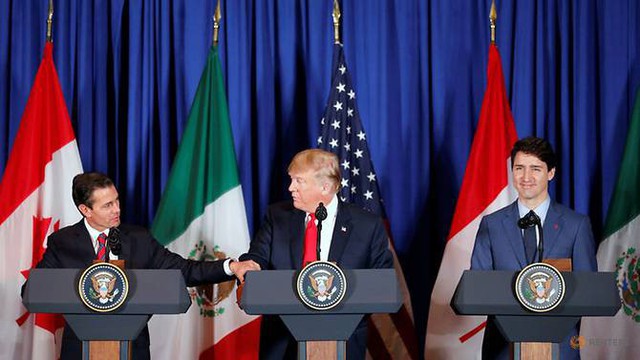 Mỹ, Canada, Mexico phá rào thương mại vào phút chót - Ảnh 1.