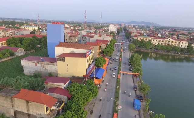 Bắc Giang có huyện đầu tiên đạt chuẩn nông thôn mới - Ảnh 1.