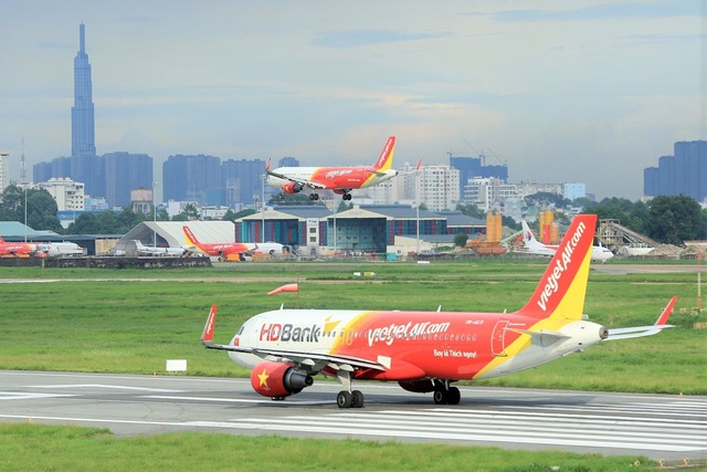 Đồng loạt mở 2 đường bay quốc tế Đà Nẵng - Singapore và Hong Kong, Vietjet khuyến mãi khủng triệu vé chỉ từ 0 đồng - Ảnh 1.