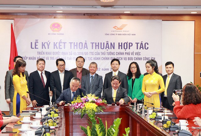 Bộ Công Thương và Bưu điện Việt Nam hợp tác đẩy nhanh quá trình cải cách thủ tục hành chính - Ảnh 1.