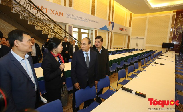 Thủ tướng kiểm tra công tác chuẩn bị tại Trung tâm báo chí phục vụ hội nghị Thượng đỉnh Mỹ-Triều - Ảnh 4.