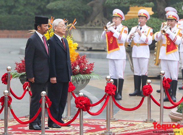 Tổng Bí thư, Chủ tịch nước Nguyễn Phú Trọng chủ trì Lễ đón chính thức Quốc vương Brunei thăm cấp Nhà nước tới Việt Nam - Ảnh 6.