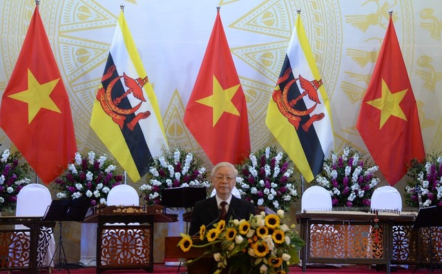 Tổng Bí thư, Chủ tịch nước mở tiệc chiêu đãi Quốc vương Brunei - Ảnh 1.