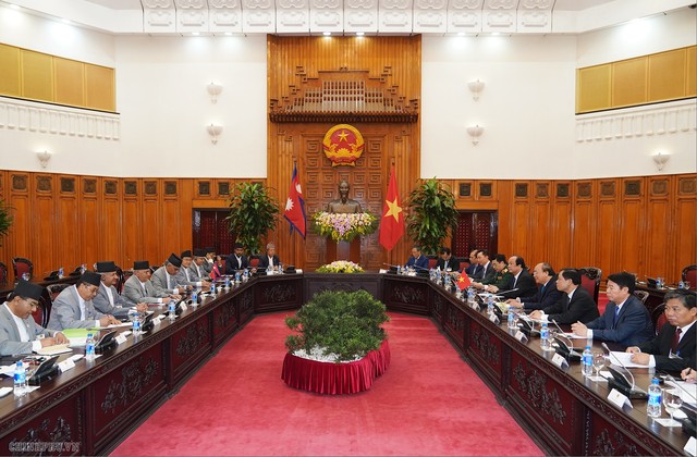 Thủ tướng Việt Nam và Nepal nhất trí xem xét mở cửa thị trường nông sản - Ảnh 1.