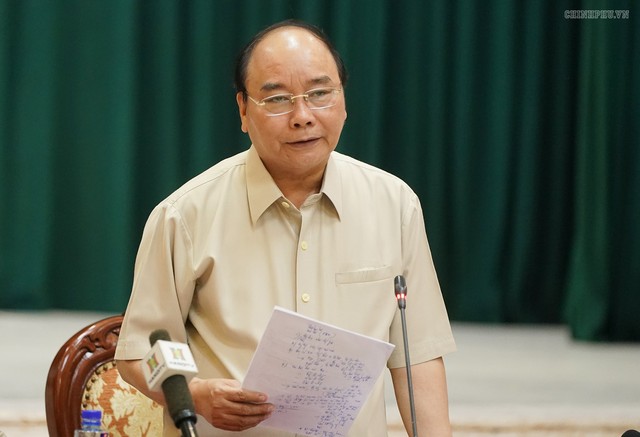 Thủ tướng Nguyễn Xuân Phúc: Huy động cả hệ thống chính trị vào cuộc trong công tác phòng chống dịch tả lợn châu Phi - Ảnh 1.
