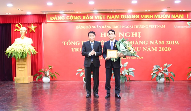 Đảng bộ Vietcombank tổ chức Hội nghị tổng kết công tác Đảng năm 2019 và triển khai nhiệm vụ năm 2020 - Ảnh 4.