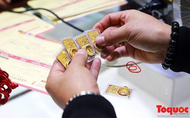 Lo ngại virus corona, giá vàng đầu năm tăng dựng đứng - Ảnh 1. Lo ngại virus corona, giá vàng đầu năm tăng dựng đứng - Ảnh 1.