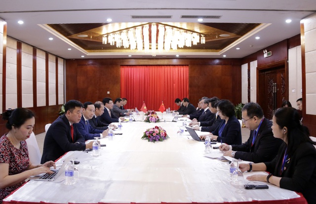 Phó Thủ tướng Phạm Bình Minh gặp Bộ trưởng Ngoại giao Trung Quốc, Lào - Ảnh 1.