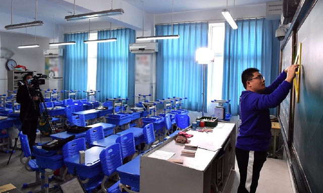 Giữa tâm dịch nCoV, Bộ Giáo dục Trung Quốc yêu cầu các trường đại học phải dạy học trực tuyến  - Ảnh 1.