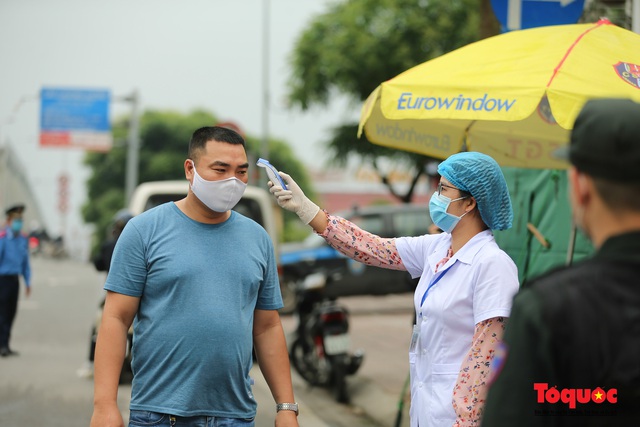 Hà Nội: Phát huy hiệu quả từ các chốt kiểm dịch Y tế nơi cửa ngõ thành phố - Ảnh 9.