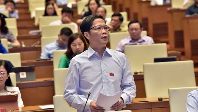 Bộ trưởng Trần Tuấn Anh lý giải việc điều hành xuất khẩu gạo trước Quốc hội - Ảnh 1.