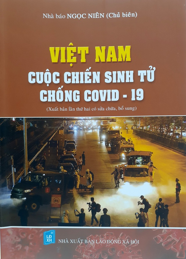 &quot;Việt Nam - cuộc chiến sinh tử chống Covid-19&quot; xuất bản lần 2 với nhiều hình ảnh và tư liệu mới - Ảnh 1.