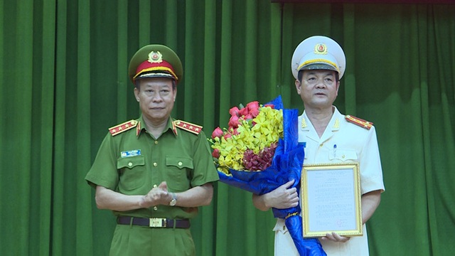 Bộ Công an trao quyết định bổ nhiệm Đại tá Lê Hồng Nam giữ chức Giám đốc Công an TPHCM - Ảnh 1.