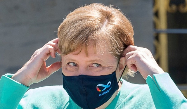 Mặc tương lai mơ hồ của đảng cầm quyền Đức, Thủ tướng Merkel trở lại &quot;huy hoàng&quot; trong vai trò nhà lãnh đạo khủng hoảng - Ảnh 2.
