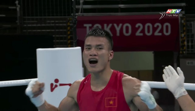 Boxing Việt Nam thắng nghẹt thở trận ra quân tại Olympic - Ảnh 1.