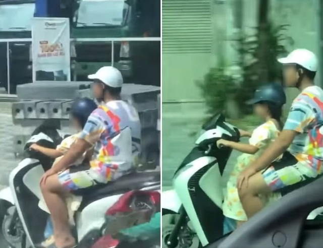 Clip: Người đàn ông ung dung ngồi sau để bé gái điều khiển xe máy băng băng trên đường - Ảnh 1.