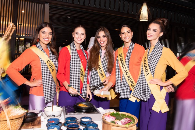 Dàn thí sinh Miss Grand International tại Huế: Lần đầu mặc áo bà ba đổ bánh xèo, Lê Hoàng Phương dừng bước phần thi này - Ảnh 1.