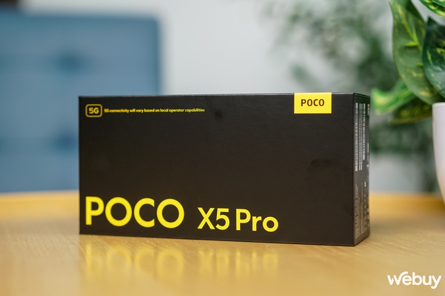 Mở hộp POCO X5 Pro tại Việt Nam: Tông vàng đen lạ mắt, màn hình 120Hz và camera 108MP - Ảnh 1.
