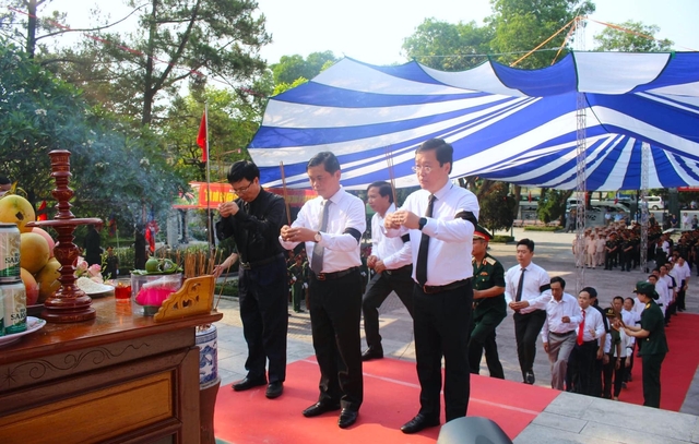 An táng 96 hài cốt liệt sĩ quân tình nguyện và chuyên gia Việt Nam hy sinh tại Lào - Ảnh 9.