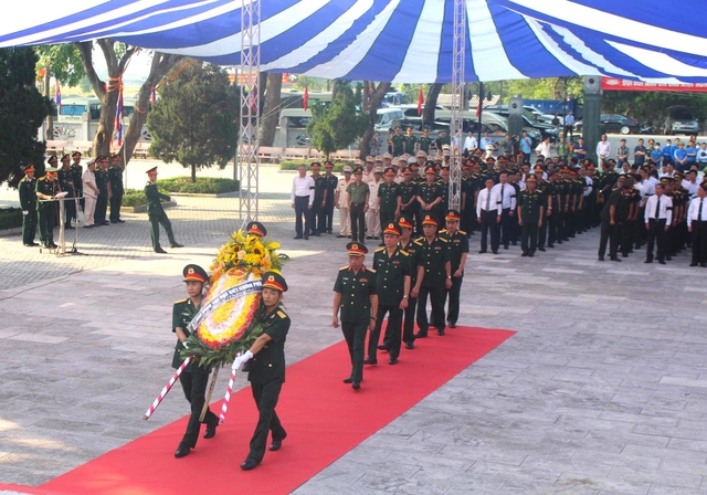 An táng 96 hài cốt liệt sĩ quân tình nguyện và chuyên gia Việt Nam hy sinh tại Lào - Ảnh 10.